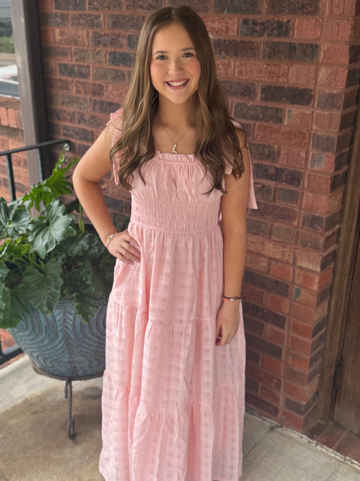 Light pink sleeveless tie strap textured midi tiered dress