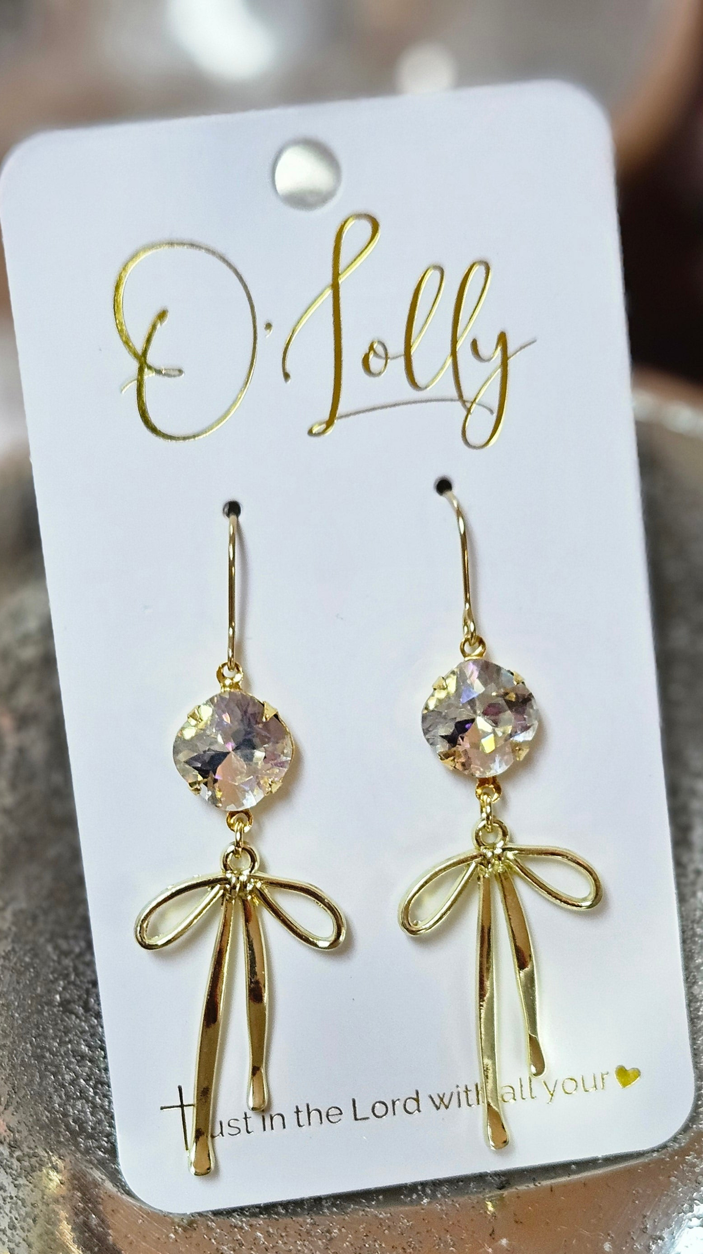 O’Lolly “Blakely” Earrings” -clear stone w/ bow dangle